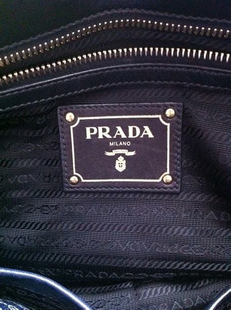 how to tell if a purse is real prada|prada authentic handbags guide.